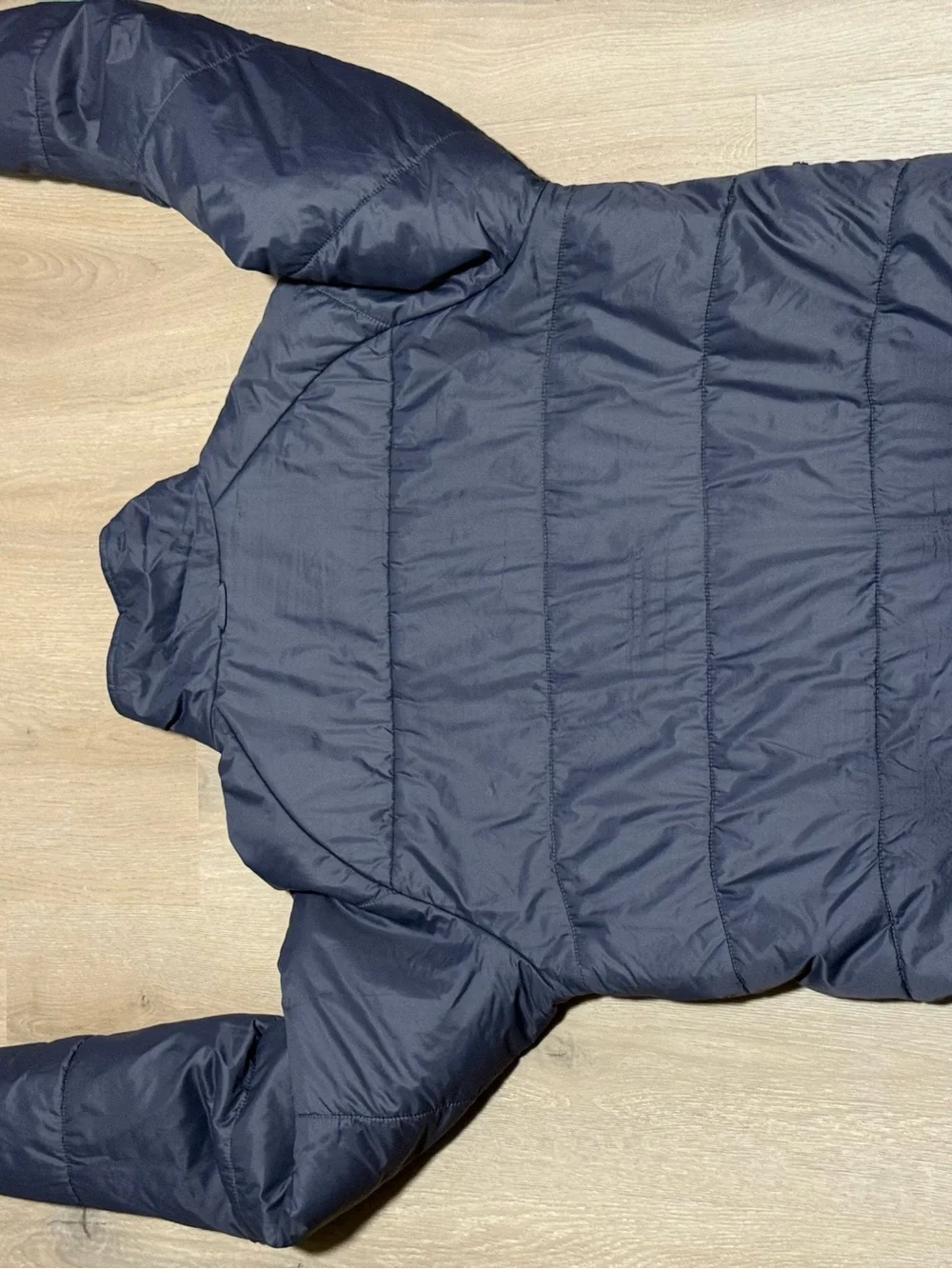 The North Face Navy Puffer Jacket with Orange Accents